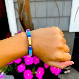 This bracelet is a one size fits all! This clay bead bracelet is hand made.